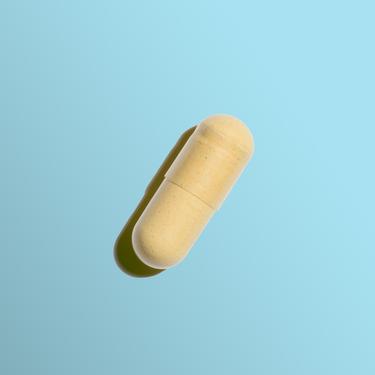Curcuma Pill in blue background